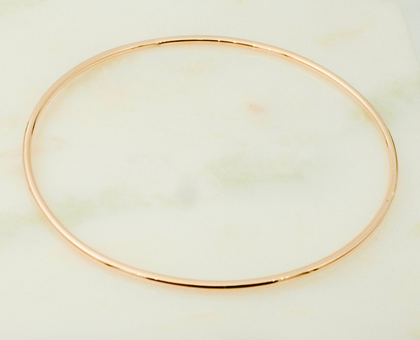 Rose gold wire bangle