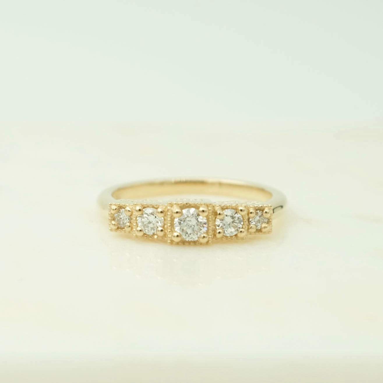 Gold and diamond ring