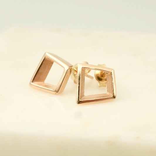 Angular gold earrings